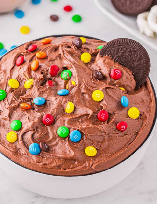 Oreo cookie dough dip in a white bowl.