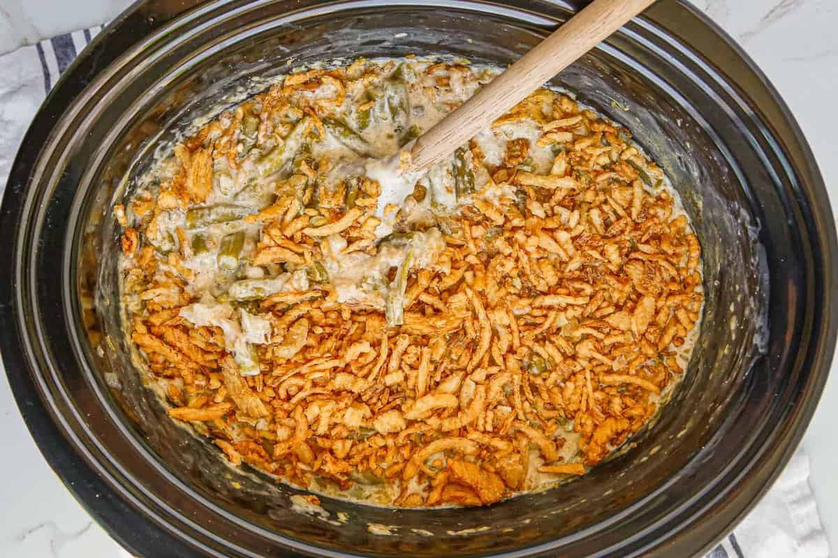 overhead image of crockpot green bean casserole