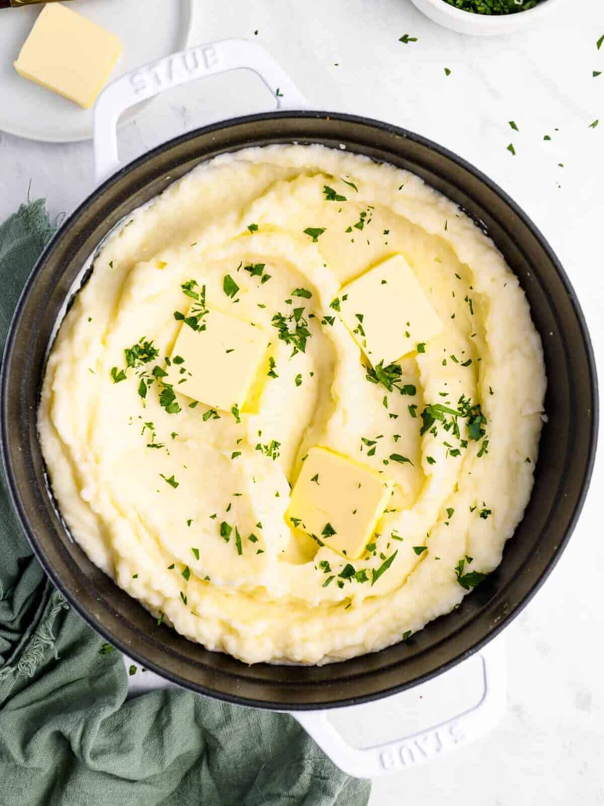 mashed potatoes in a cast iron skillet.