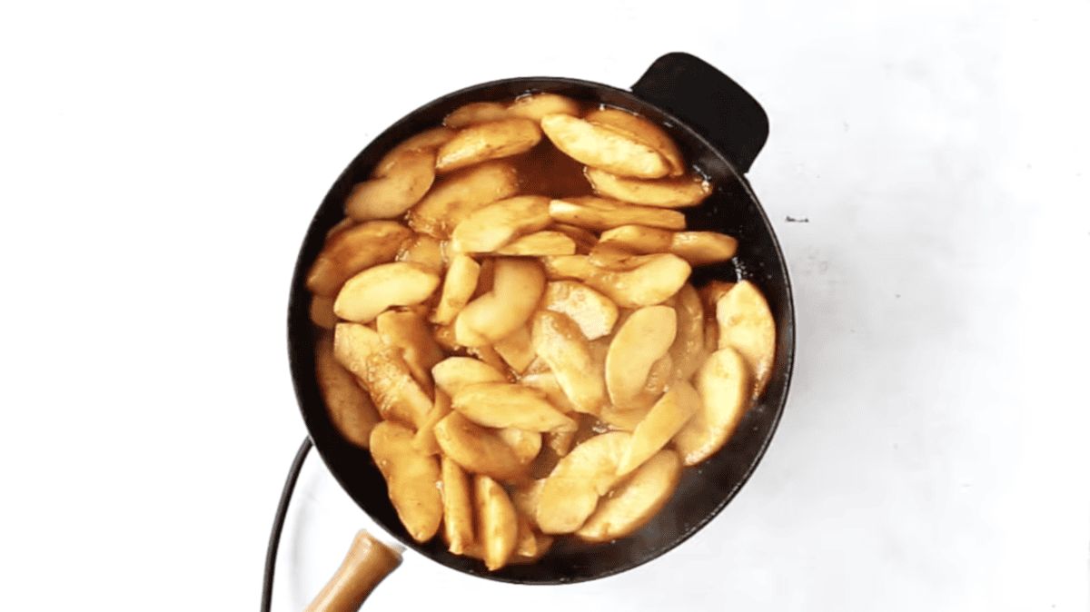 fried apples in a skillet.