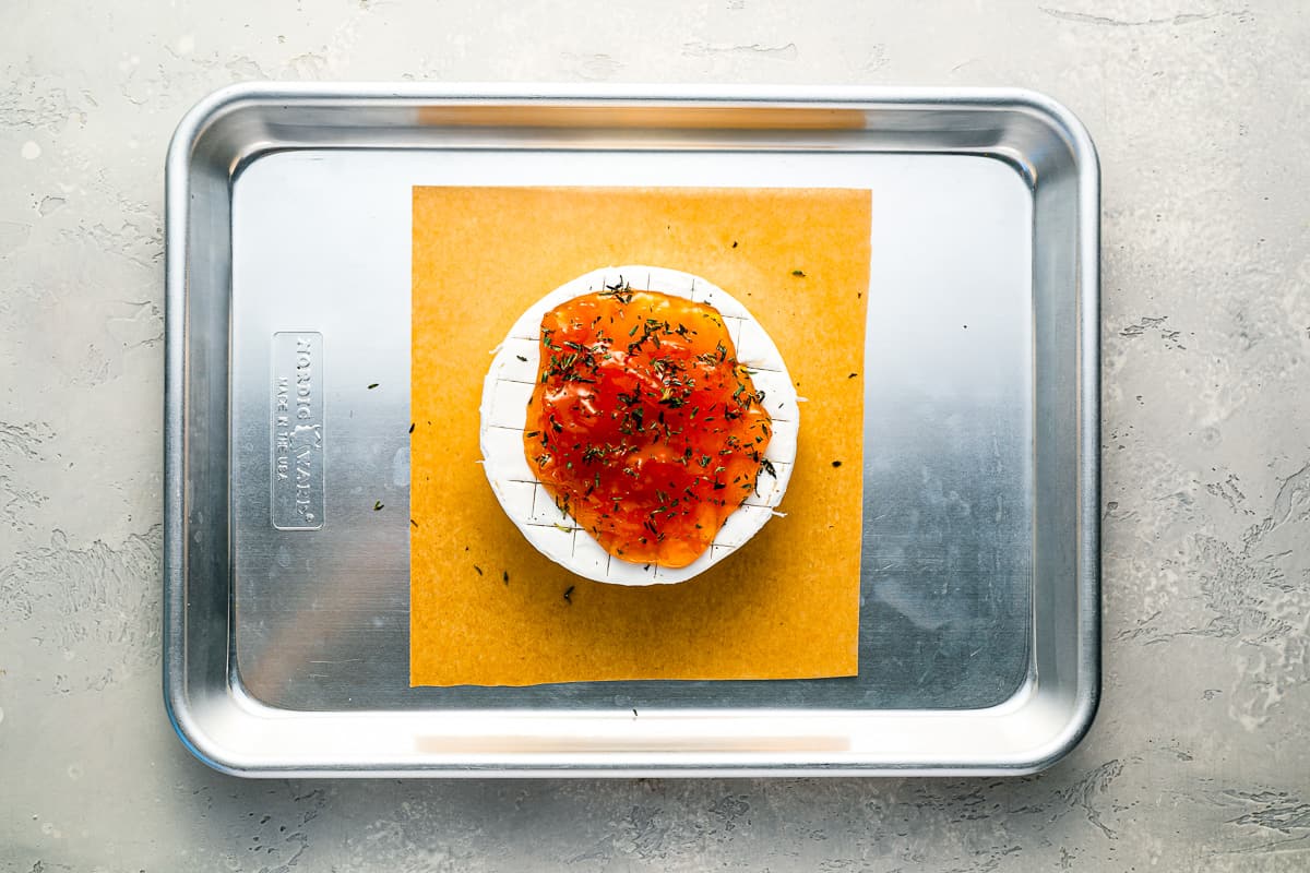 A tray with a piece of salmon on it.