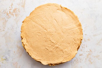 Peanut butter pie on a marble surface.