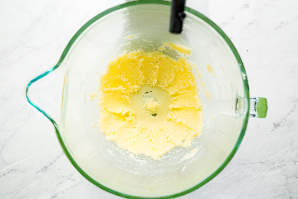 A bowl of butter in a blender.