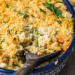 turkey and rice casserole in a dish with spoon