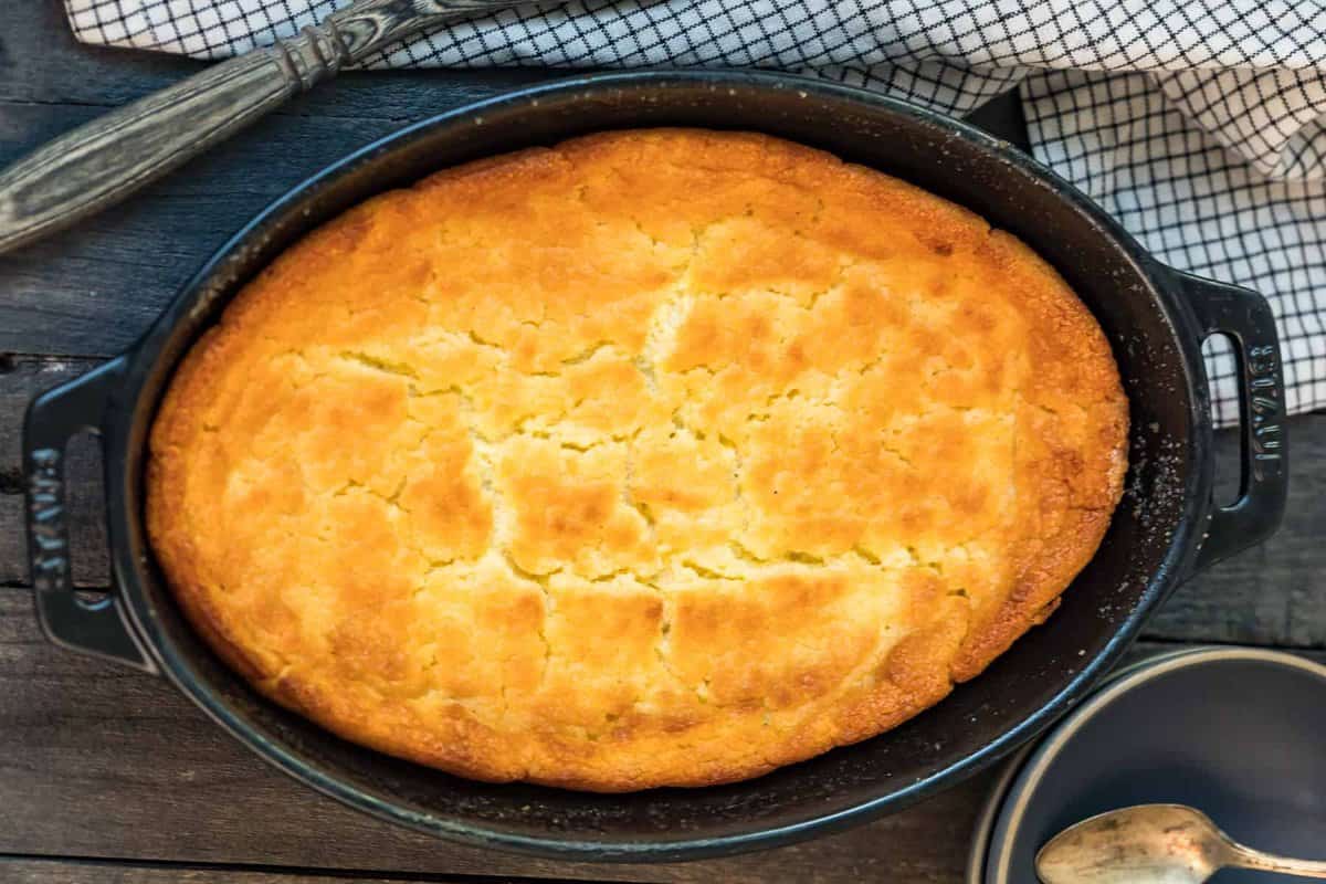 buttermilk spoon bread in black baking dish