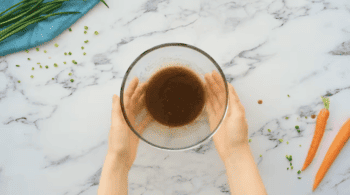 spiced melted butter in a glass bowl.