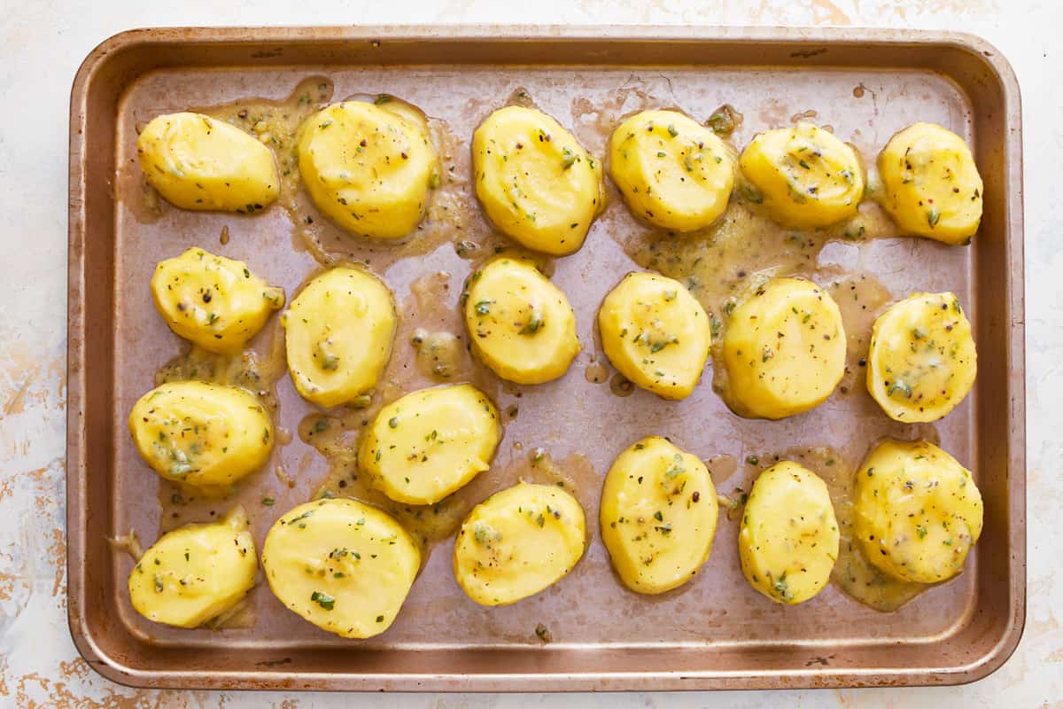 Baked potatoes on a baking sheet.