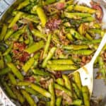 A sauteed asparagus and bacon pan.