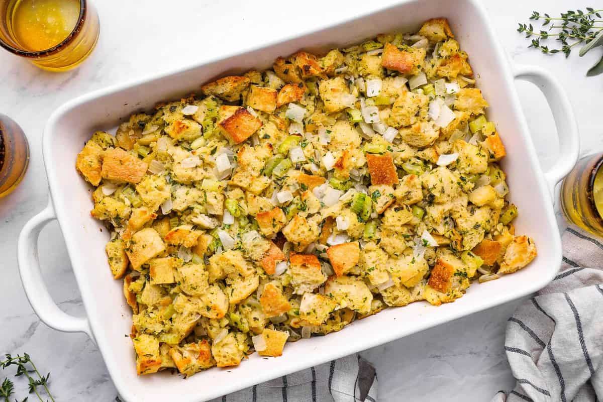 overhead view of vegetarian stuffing in a white baking dish.