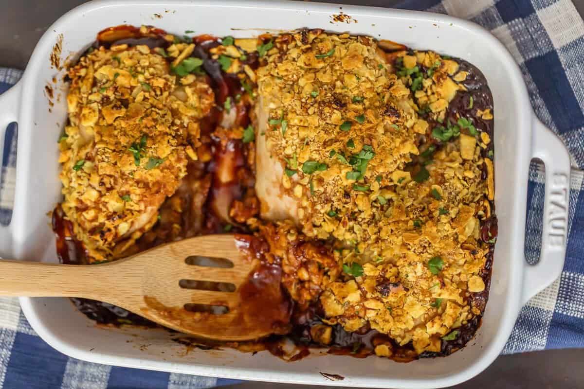 A casserole dish filled with baked bbq chicken