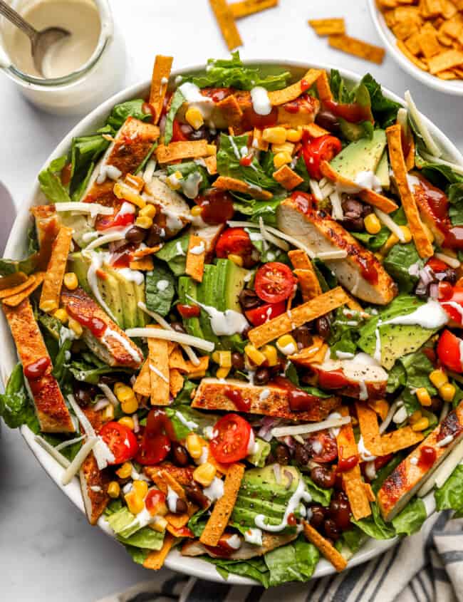 bbq chicken salad in a white bowl