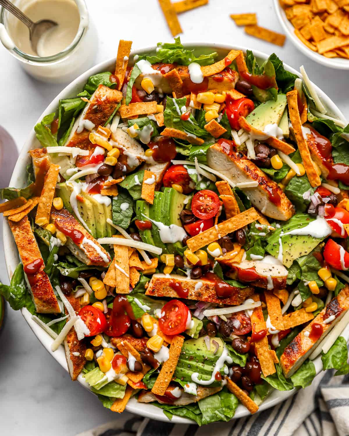 bbq chicken salad in a white bowl