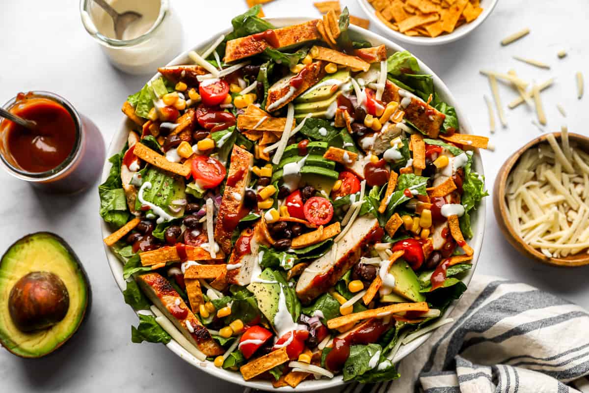 bbq chicken salad in a white bowl