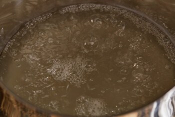 boiling water in a pot.