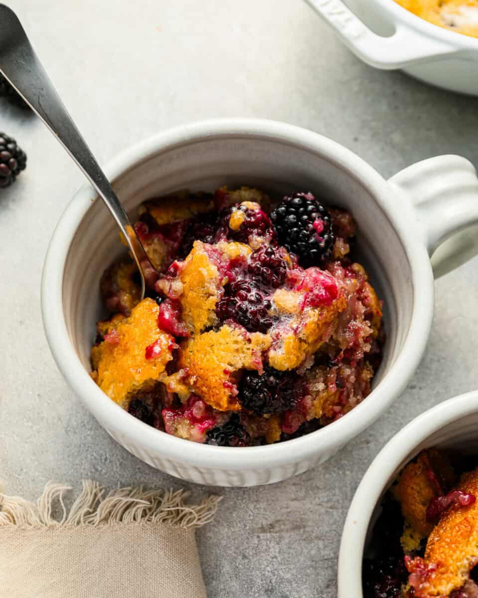 Blackberry cobbler in a ramekin.