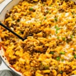 A pot of cheeseburger casserole stuffed with ground beef, cheese, and macaroni.