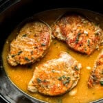 pork chops in gravy in a slow cooker.