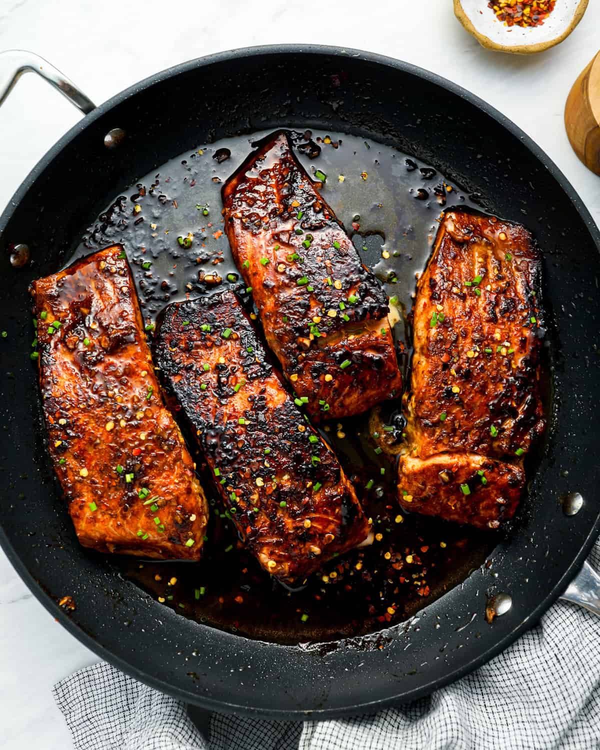 firecracker salmon in a frying pan.