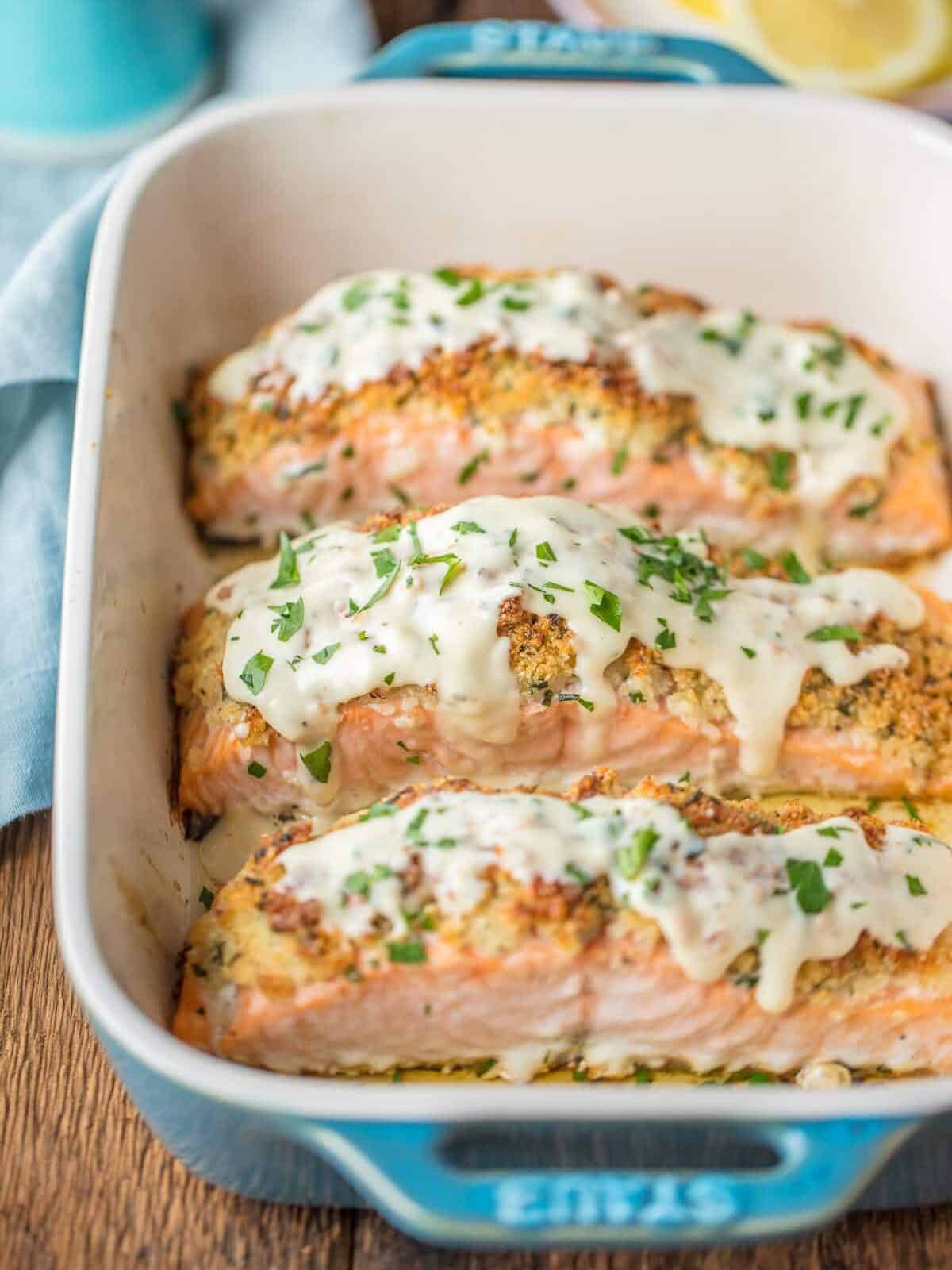 Parmesan Crusted Salmon topped with white wine sauce