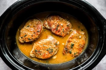 pork chops and gravy in a crockpot.