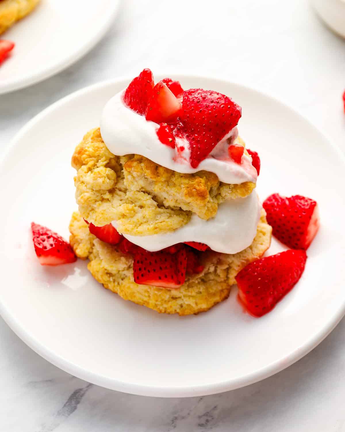 strawberry shortcake on a white plate.