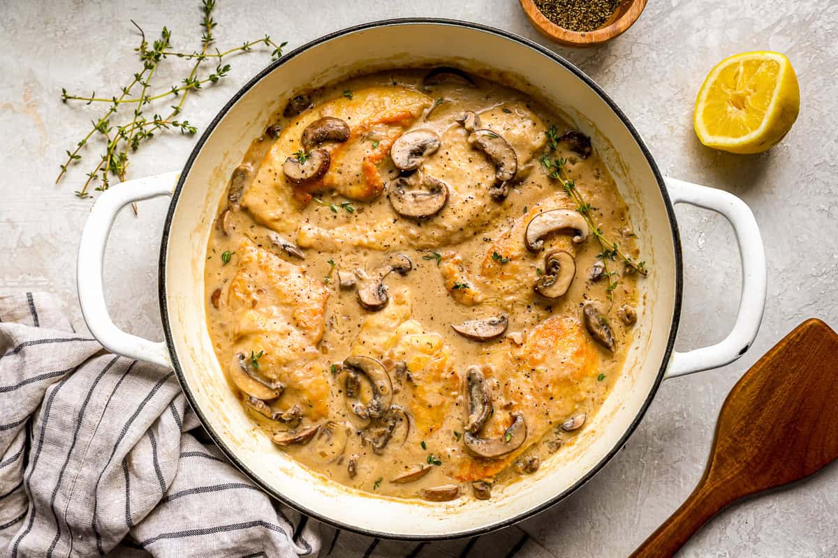 overhead view of mushroom chicken in a Dutch oven.