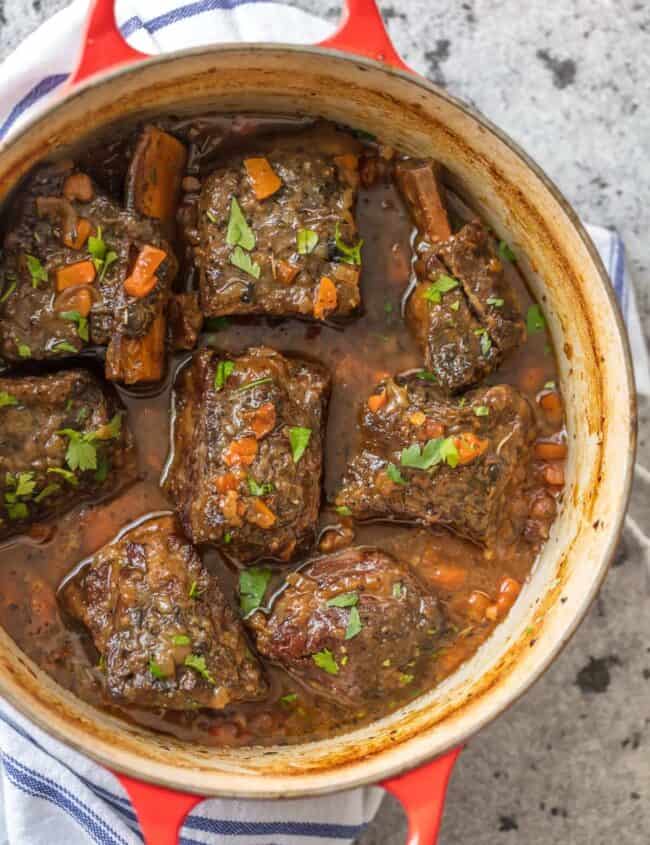 We love these DUTCH OVEN HONEY BOURBON SHORT RIBS! It's so easy to make these flavorful and fall off the bone ribs right in your dutch oven. Less cleanup and more flavor!