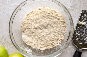 dry ingredients for pie crust in a glass bowl.