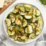 roasted zucchini on a white plate.