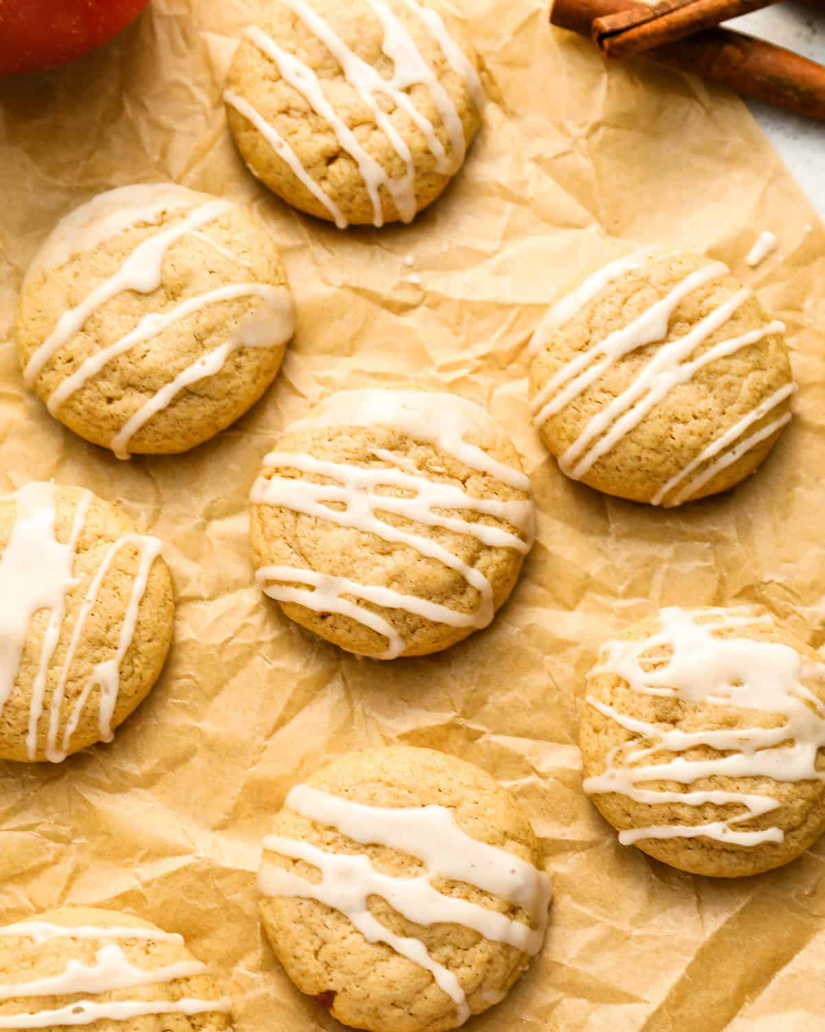 overhead view of apple cider cookies on parchment paper.