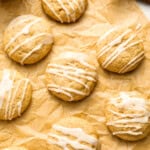 overhead view of apple cider cookies on parchment paper.