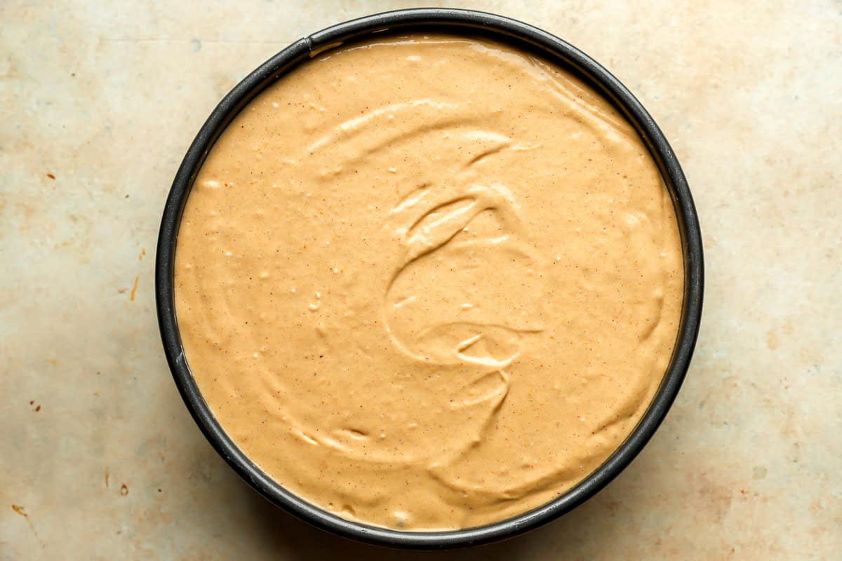 pumpkin cheesecake batter in a springform pan.